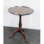 Oak topped tripod table with broken pie crust edge on a mahogany baluster column, 70 x 50cm