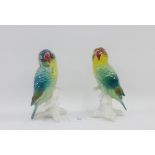 Pair of Karl Ens parrots with printed backstamps, 15cm high