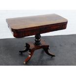 19th century mahogany foldover card table on a baluster column with quadripartite base and splayed