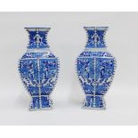 Pair of Chinese blue and white vases of square baluster form, painted with stylised motifs within