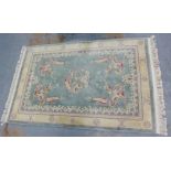 Chinese wool rug the pale green field with Dragon design, 305 x 104cm
