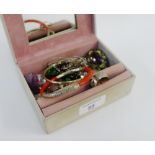 Jewellery box containing a quantity of silver jewellery to include rings,necklaces, coral bracelet