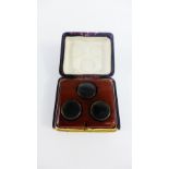 Set of three lenses contained within a small mahogany case