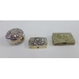 Sterling silver pill box and two white metal pill boxes, largest 5cm (3)