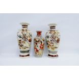 Pair of Japanese earthenware vases with mythical bird handles painted with Warriors, together with a