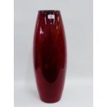 Contemporary red glazed pottery vase, 68cm high