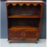 Early 20th century stained pine bookcase with two cupboard doors, 124 x 98cm