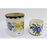 Two early 20th century Scottish Pottery jars, one with plums the other with flowers, tallest 11cm