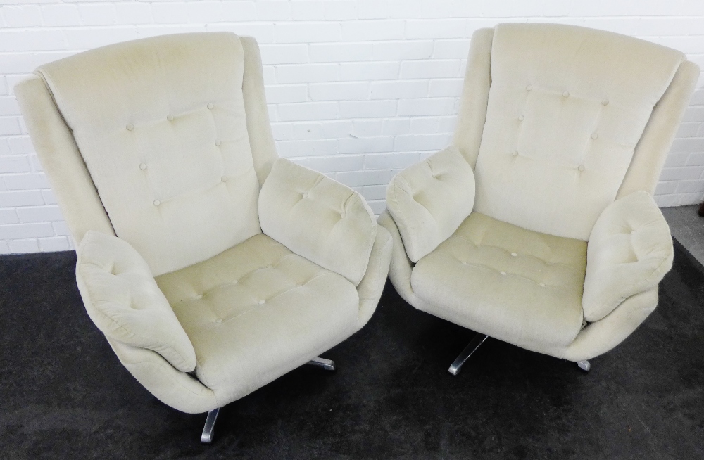 Pair of retro cream upholstered button back chairs, on chromed metal swivel base, 96 x 64cm, (2)