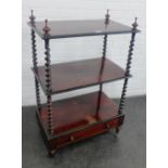 Mahogany three tier whatnot with barley twist supports and one single drawer tot he base, on brass