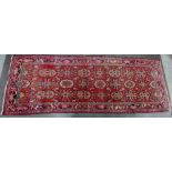 Eastern runner, the red field with allover foliate design, 290 x 100cm