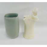 Celadon glazed studio pottery vase together with a cream glazed vase with raised thumb piece and