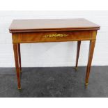 Mahogany foldover table, with gilt mounts and slender tapering legs, 75 x 90cm