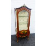 French style vitrine with gilt metal mounts, with a buttonback interior and glass shelves over a