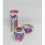 Hand painted Scottish pottery to include a vase, bowl and small baluster vase, all painted with