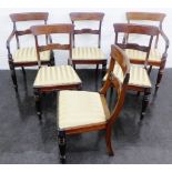 Set of six mahogany chairs with table backs and carved horizontal splats, over upholstered seats, on