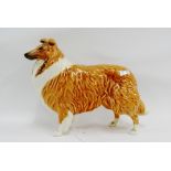 Beswick 'Lochinvar of Lady Park' dog figure with paper label, 19cm long