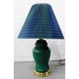 Set of three green glazed baluster table lamps with gilt metal mounts and tartan shades, (3)