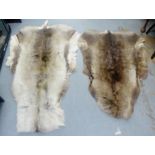 Two animal fur rugs, (2)