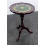 Mahogany wine table with a pie crust edge on tripod feet, 52 x 32cm