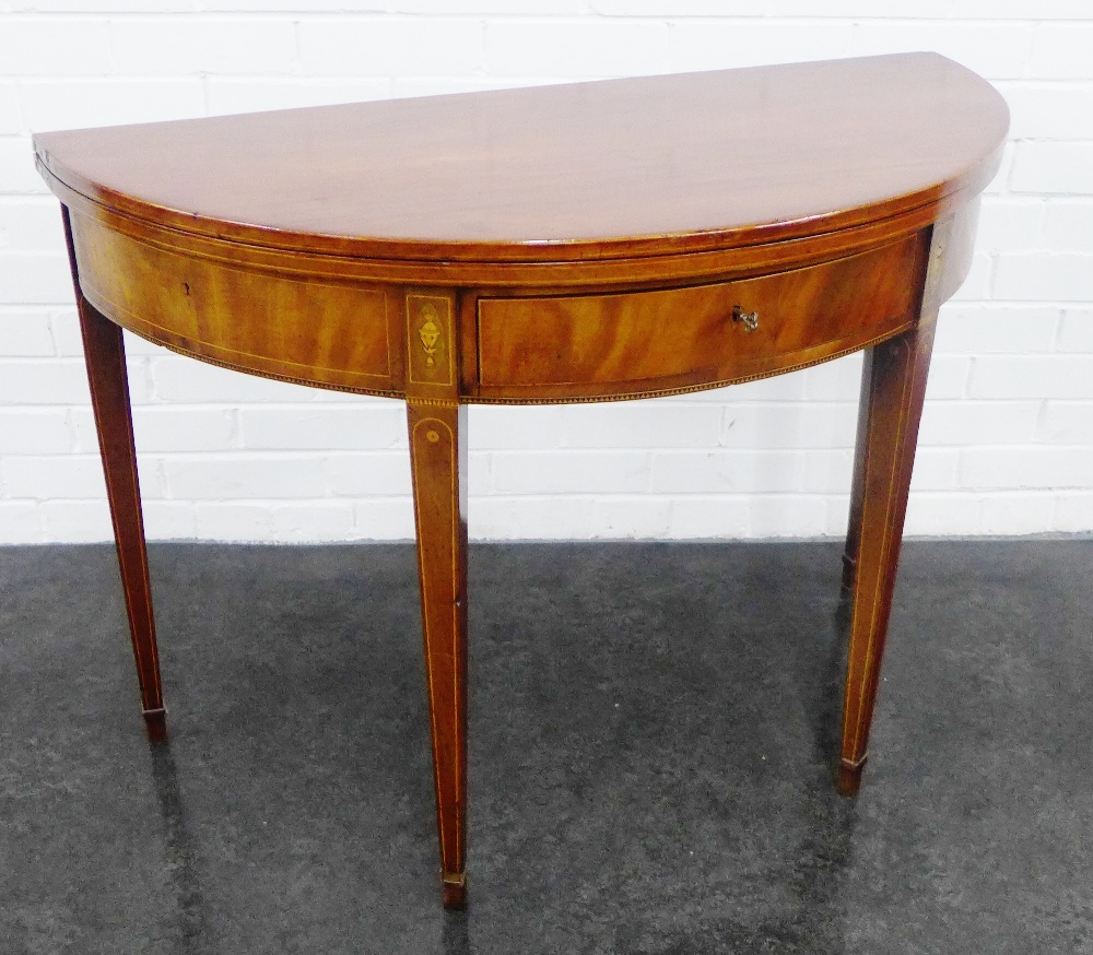 Georgian mahogany and inlaid foldover table with a single frieze drawer, on square tapering legs and