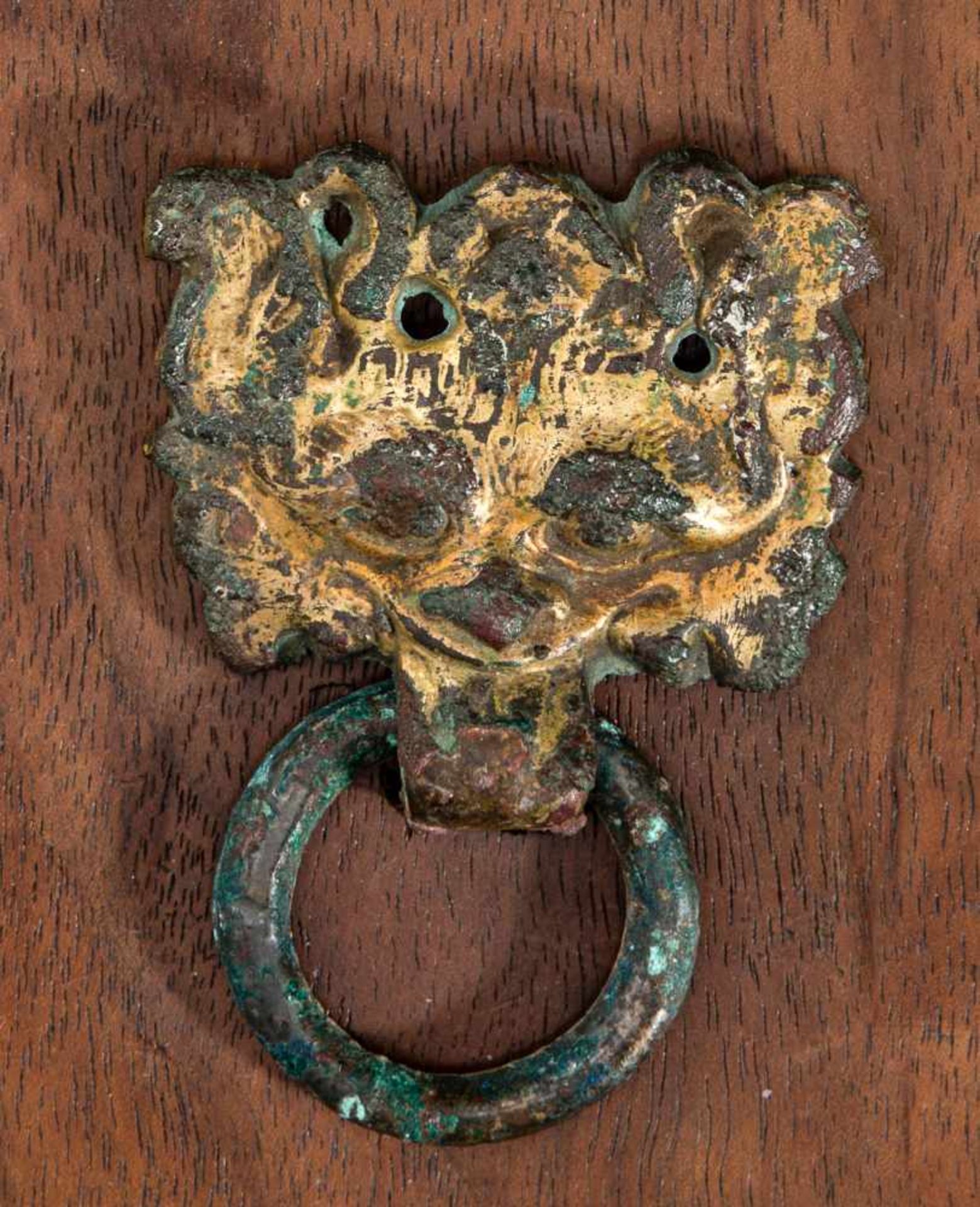 TWO METAL APPLIQUÉSBronzeChina, Han dynasty (206 BC-220 AD)Both in the shape of a taotie mask, - Image 2 of 4