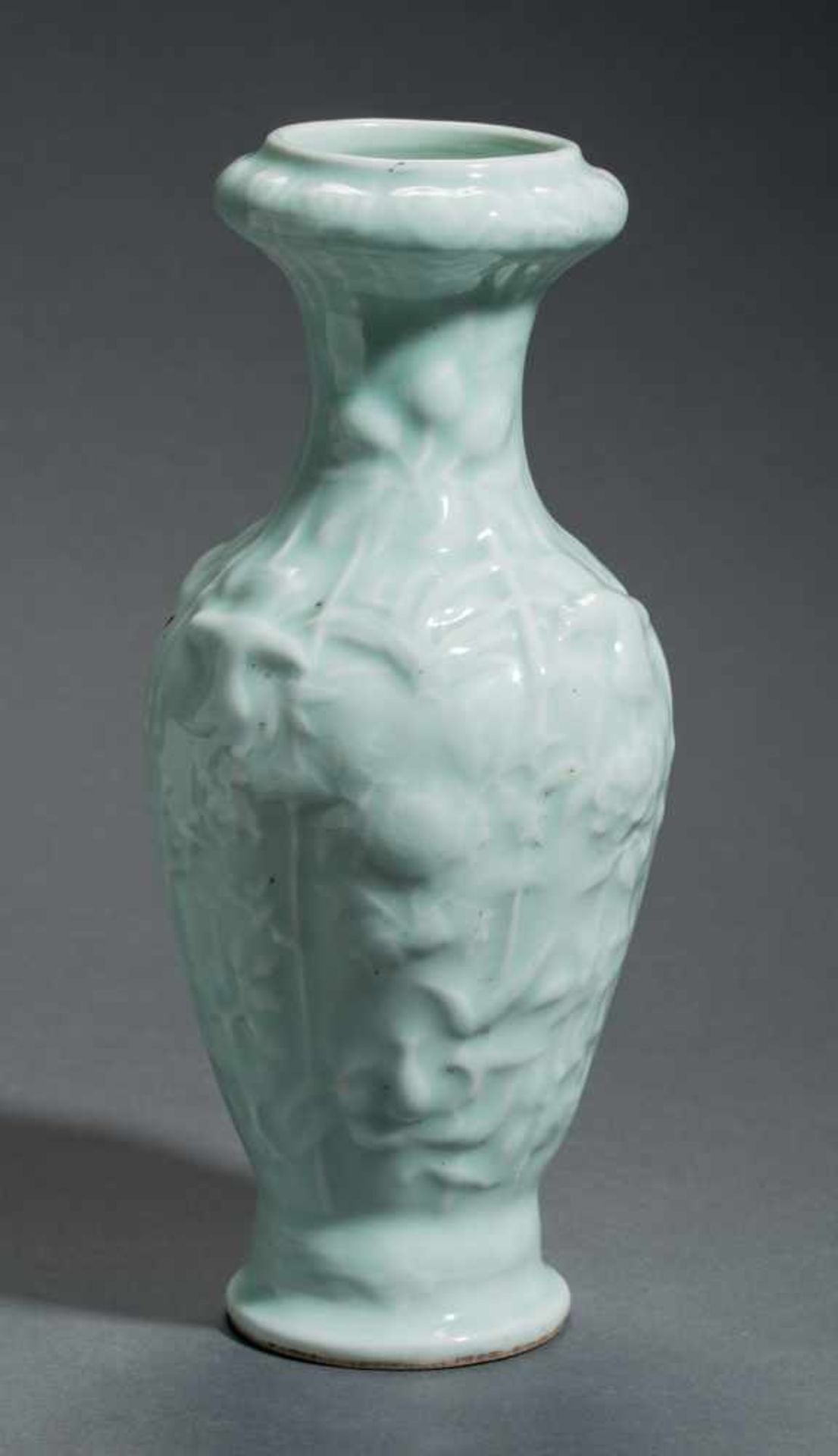 A LONGQUAN GLAZED VASE WITH HIGH RELIEFGlazed ceramic China, 20th century An attractive and
