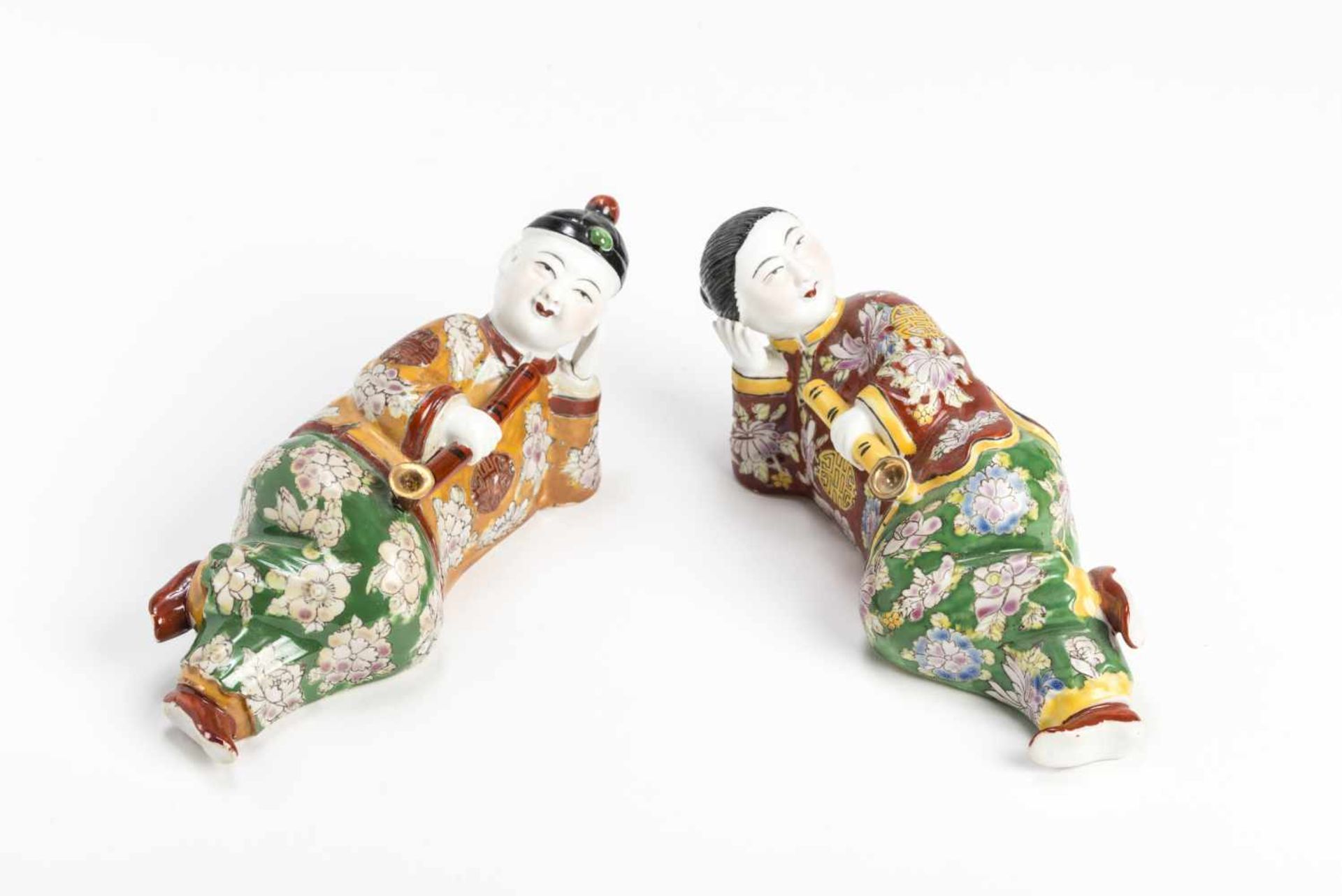 A PAIR OF CHINESSE PORCELAIN FIGURES – REPUBLIC PERIODPolychrome colors on Bisque porcelainChina,