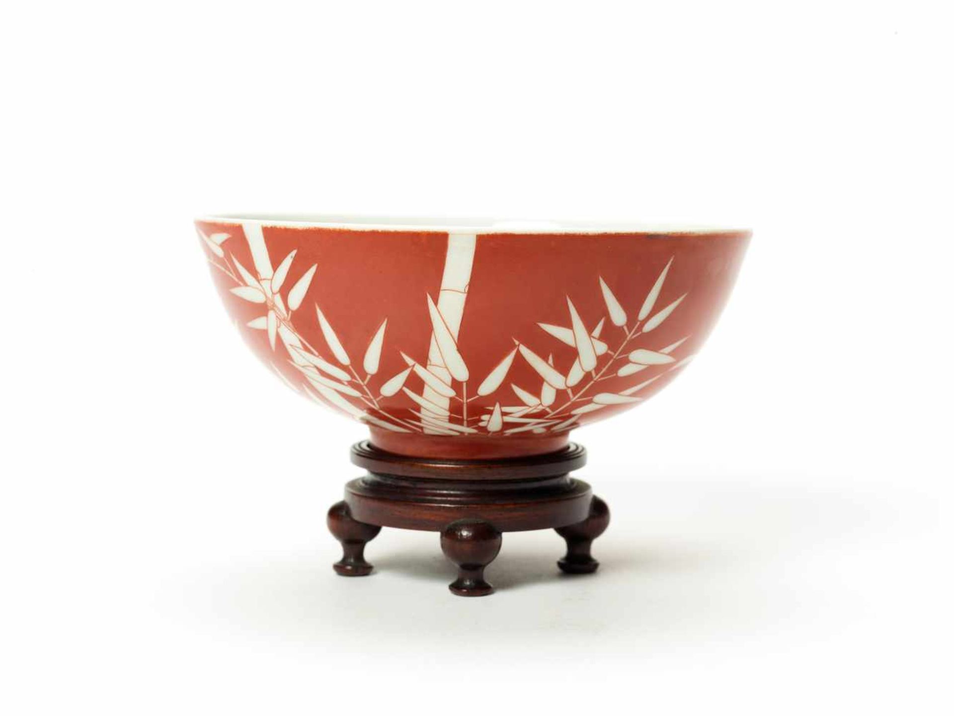 A CORAL-RED PAINTED PORCELAIN BOWL WITH BAMBOO DECORATIONPorcelainChina, Qing dynastyThe fine and