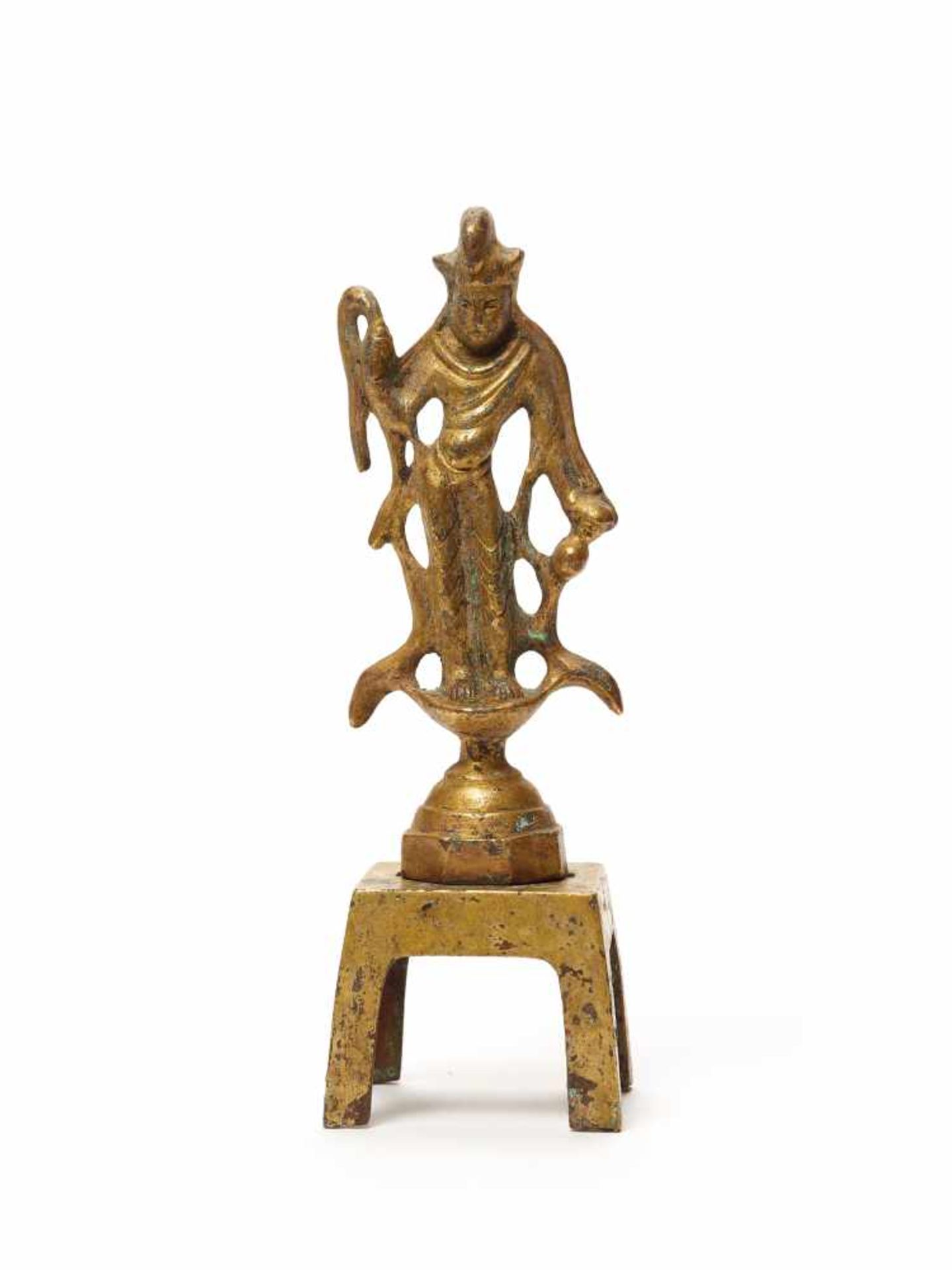 A TANG DYNASTY FIRE-GILT BRONZE GUANYIN WITH MATCHING STANDThe fine bronze with well-preserved