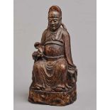 DEIFIED HIGH OFFICIALWood with gildingChina, Qing dynasty (1644-1912) A decorative sculpture of a