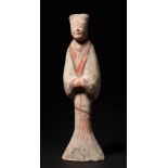 COURT LADY IN LONG ROBESTerracotta with painting China, Han Dynasty (206 BC - 220) Defined, slender,