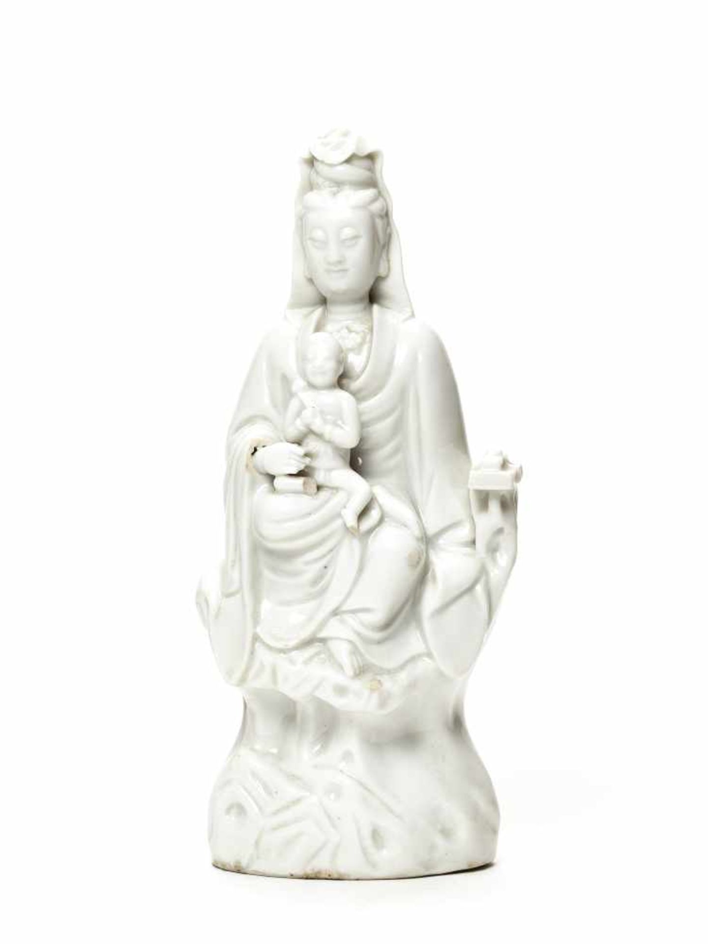 CHILDBEARING GUANYINBlanc-de-Chine porcelainChina, late QingThe Buddhist bodhisattva