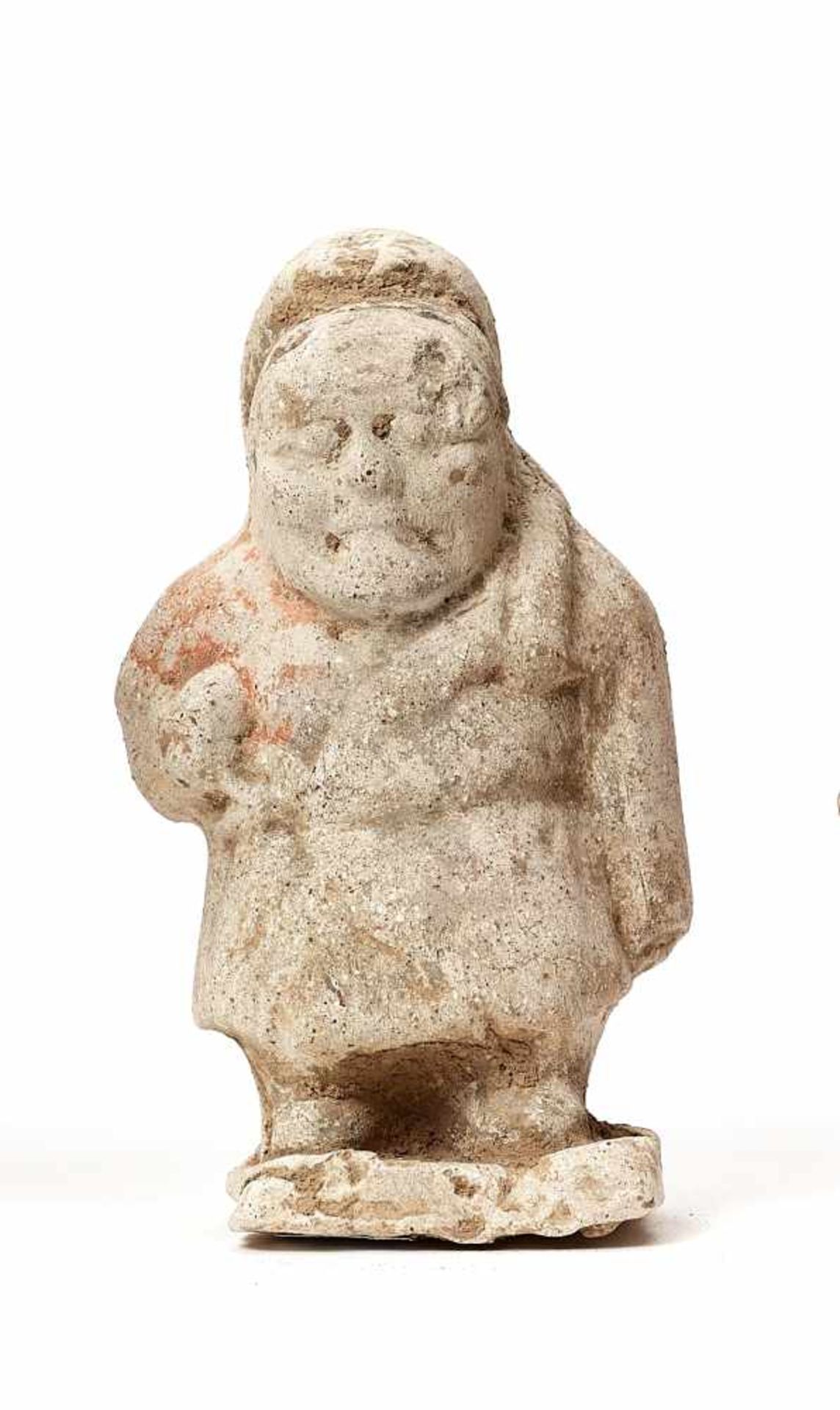 A STANDING TERRACOTTA GUARDIAN, TANG DYNASTYThe expressive statue with remainders of old