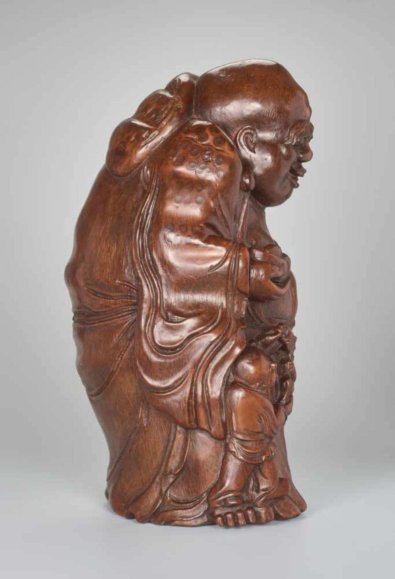 A VERY LARGE BAMBOO SHOOT CARVING OF BUDAI WITH INGOT, QING DYNASTYBamboo rootChina, Qing dynasty ( - Image 6 of 9