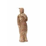MUSICIANTerracotta with painting China, Wei Dynasty (5th to 6th cent.) A rare smaller figure from