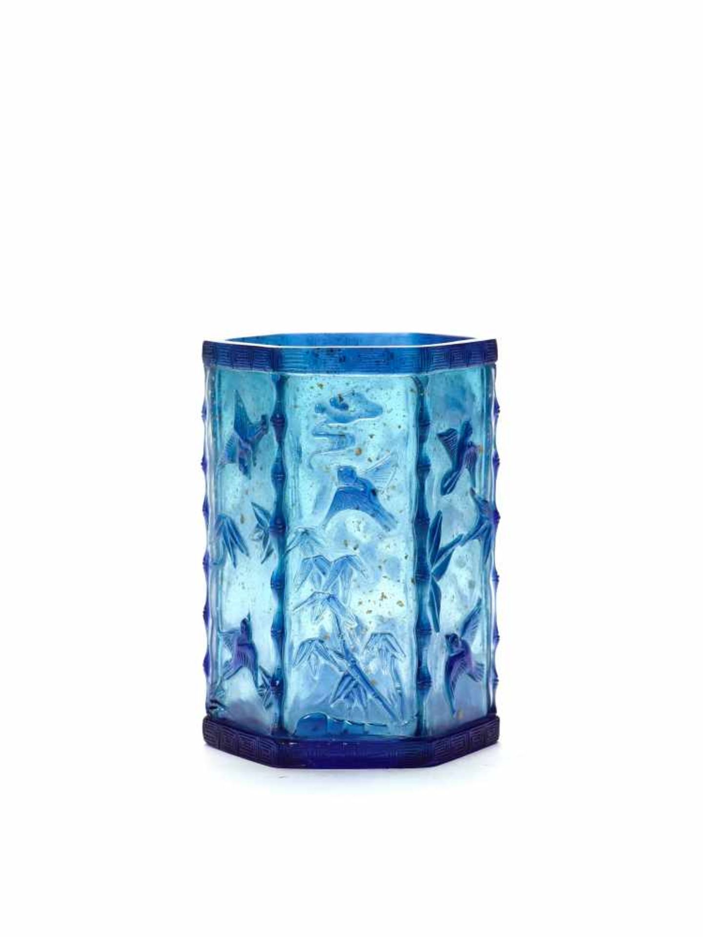 A CARVED HEXAGONAL BLUE OVERLAY GLASS BRUSH POT, QING DYNASTYTranslucent sapphire-blue overlay