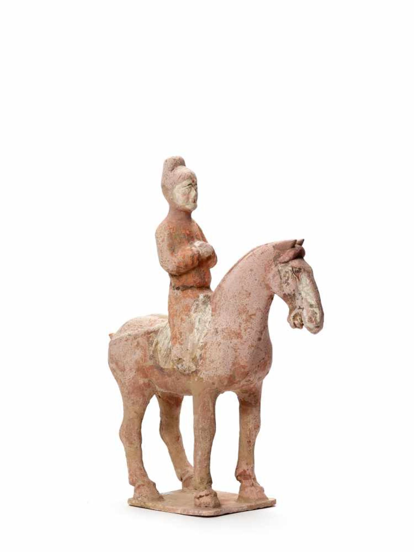 A LARGE TERRACOTTA RIDER ON HORSE, TANG DYNASTY (618-907)The subtly modeled statue with remainders