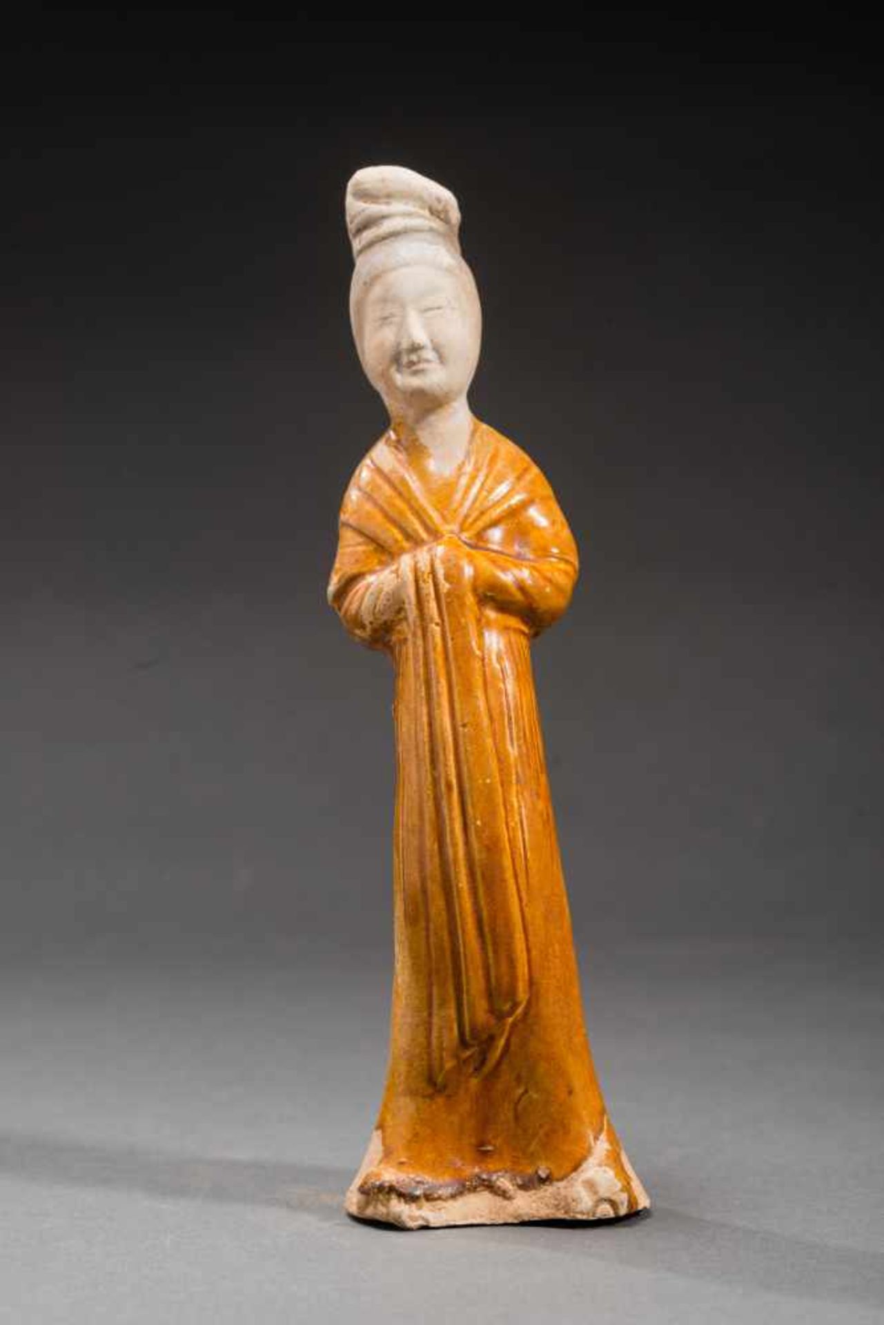FIGURINE OF A COURTLY LADY Glazed ceramic with paintingChina, Sui (581-618) to early Tang Dynasty (