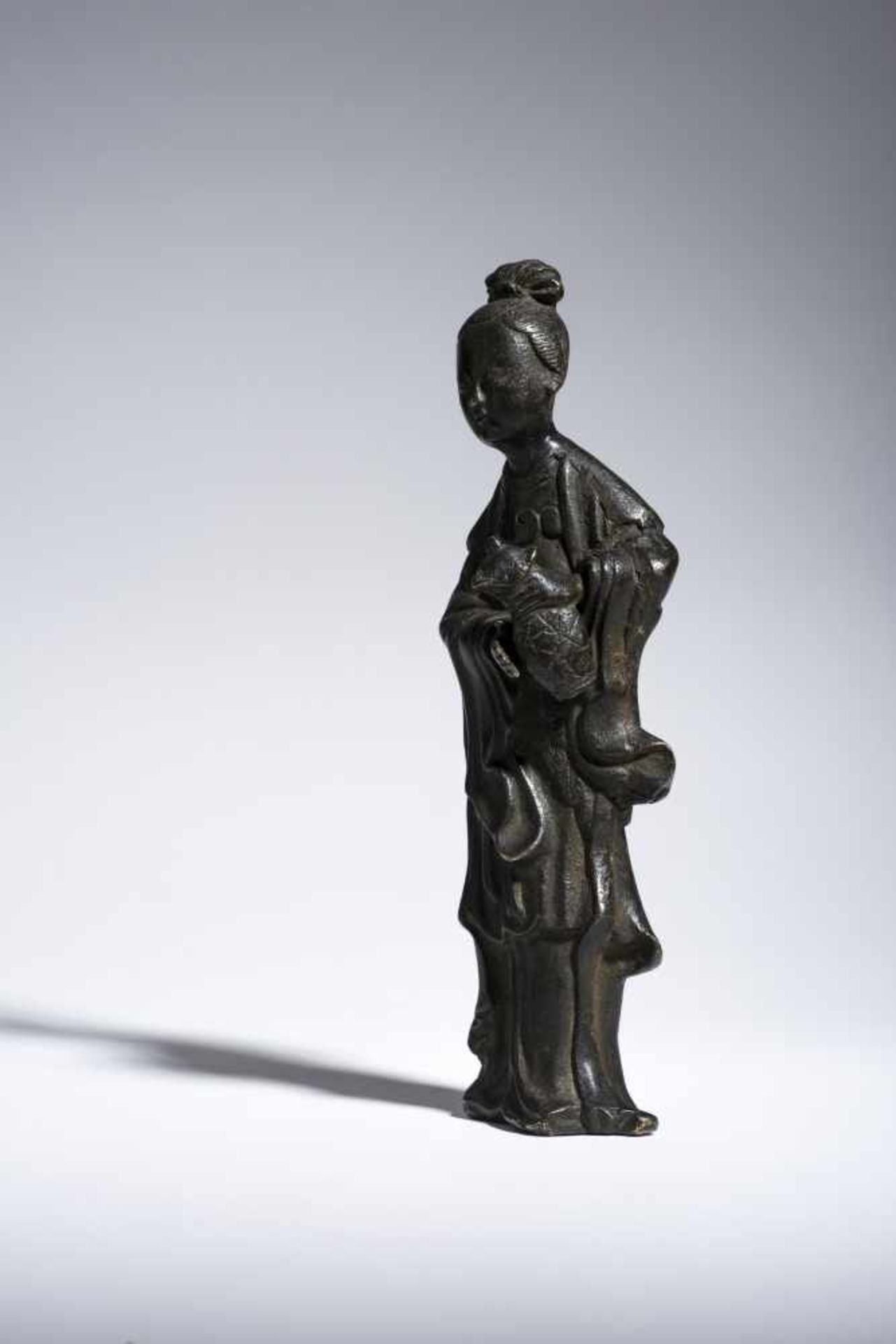 IMMORTAL WITH WATER JARBronzeChina, Qing dynasty, 19th centuryFine figure, possibly a fairy and an - Image 4 of 6