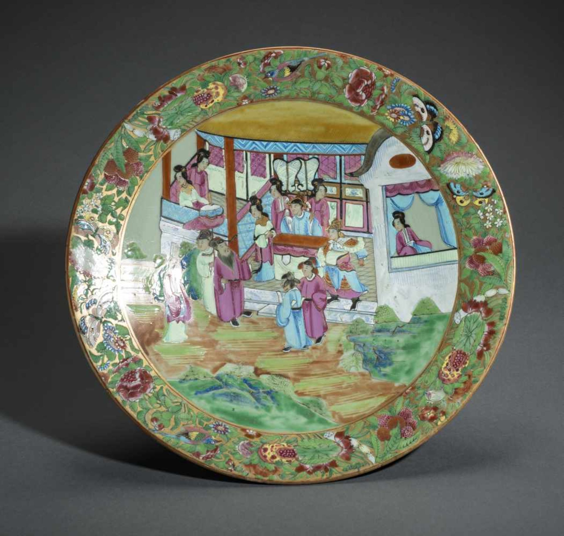 A LARGE PLATE WITH COURT SCENE, BLOSSOMS AND ANIMALSPorcelain with enamel painting and goldChina,