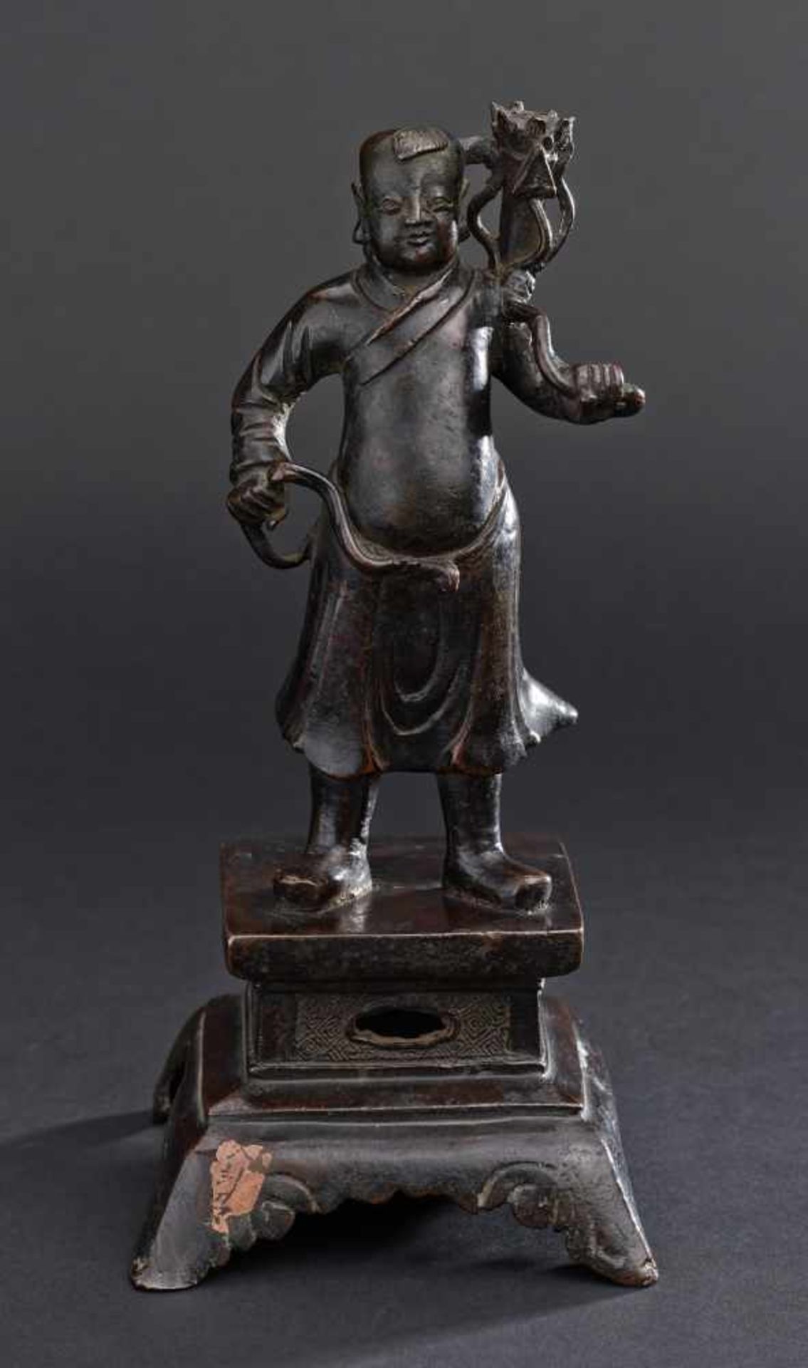 A CHINESE MING DYNASTY BOY OF LUCK STANDING ON BASEBronze China, Ming dynasty, approximately 17th