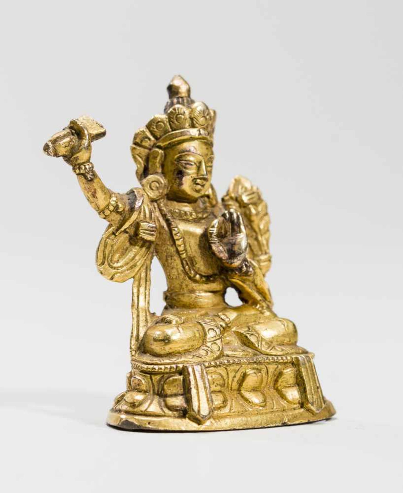 A SINO-TIBETAN FIRE-GILT MINIATURE BRONZE OF MANJUSHRI, 18TH-19TH CENTURYFire-gilt bronzeTibet, 18th - Image 6 of 7