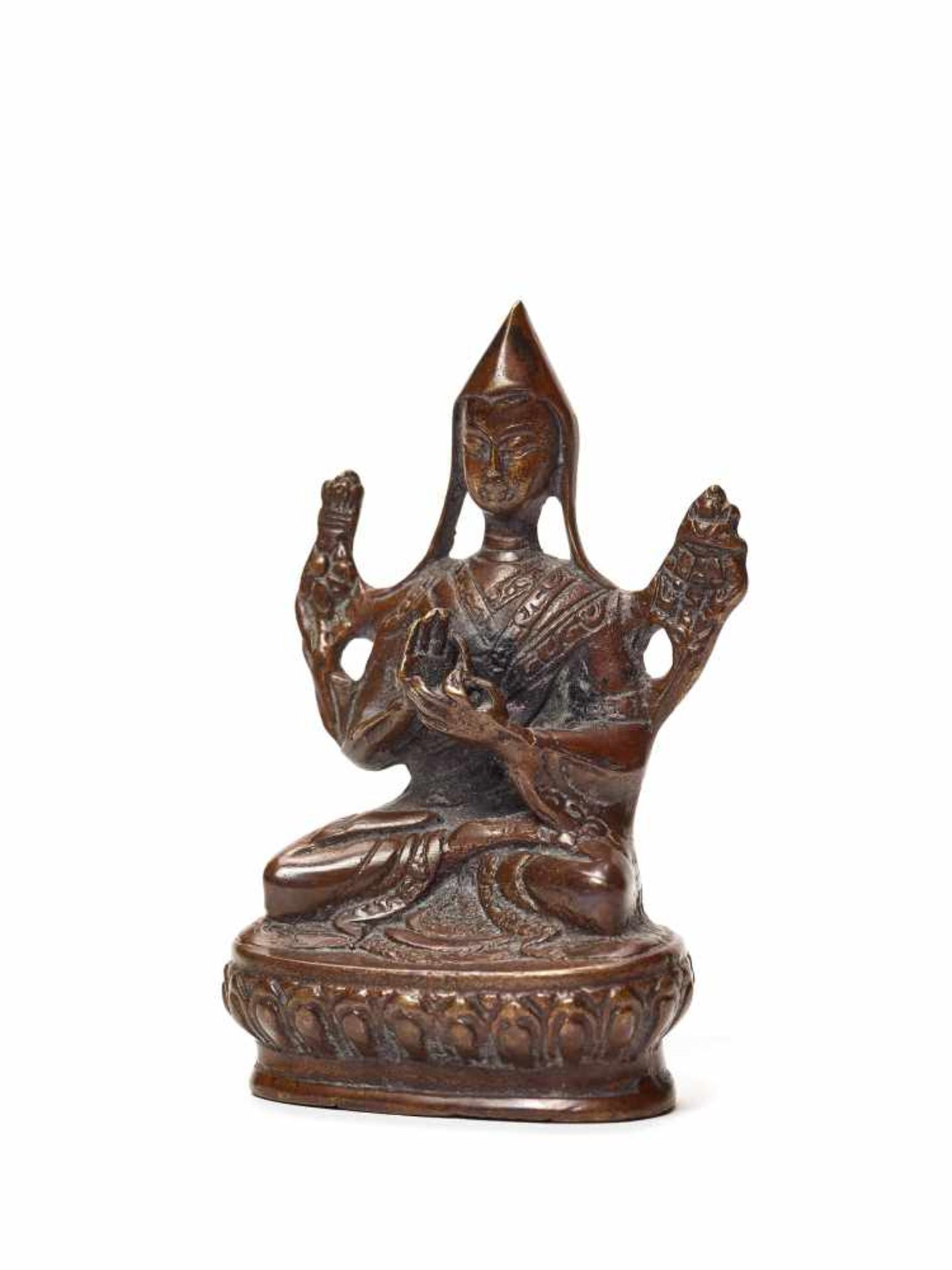 A COPPER BRONZE FIGURE OF TSONGKHAPACopper bronzeTibet, late 19th centuryTsongkhapa is considered