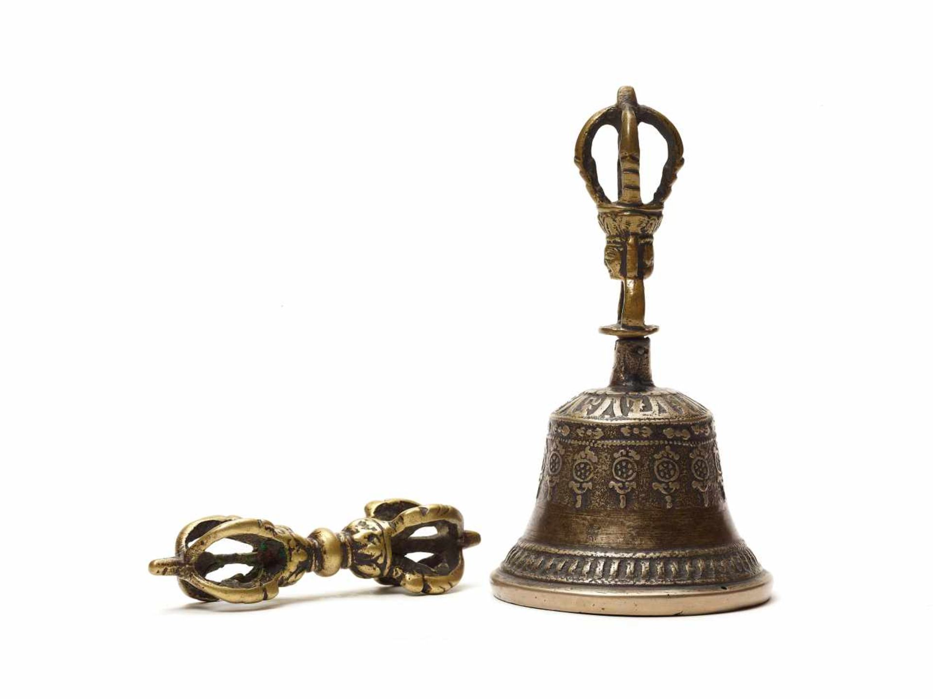 A BRONZE VAJRA AND A GHANTA BELL, 19th CENTURYBronzeTibet, 19th centuryThe handle of the Ghanta bell