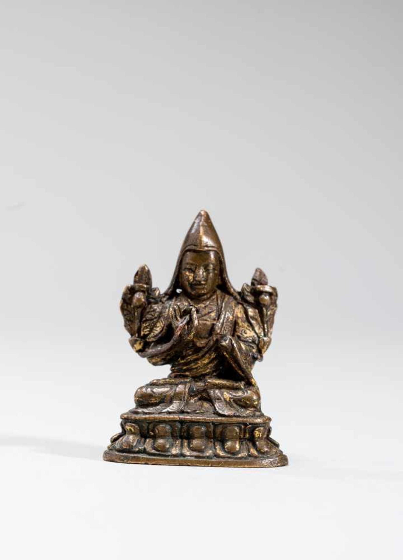 A SINO-TIBETAN MINIATURE BRONZE OF TSONGKHAPA, 18TH-19TH CENTURYBronzeTibet, 18th to 19th