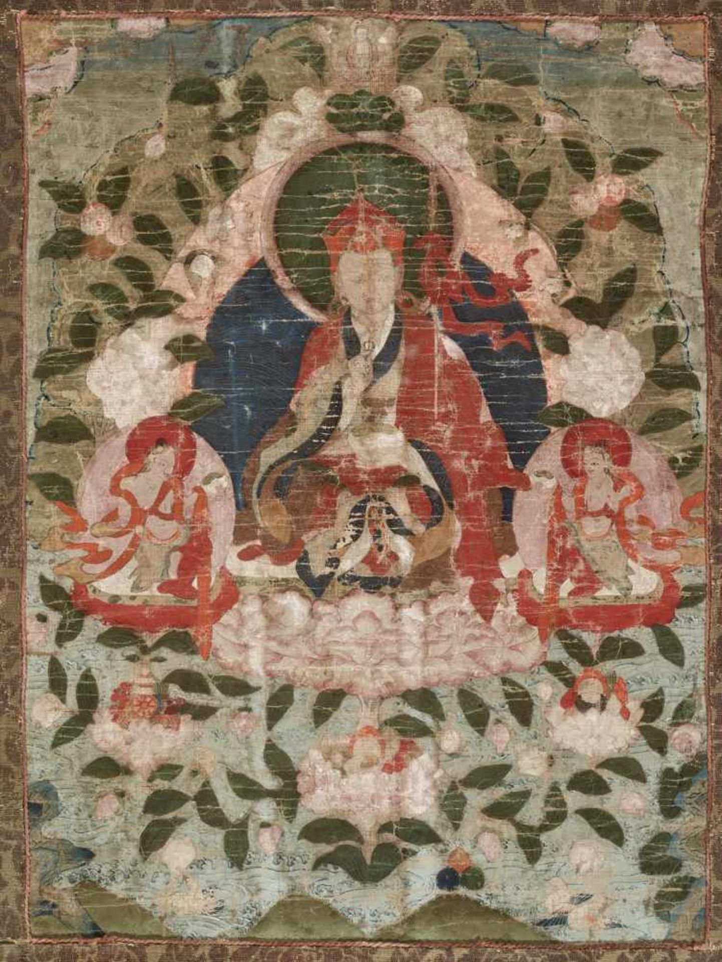 AN 18th CENTURY THANGKA OF GURU RINPOCHE IN ZANGDOK PALRIDistemper and gold paint on cloth, framed