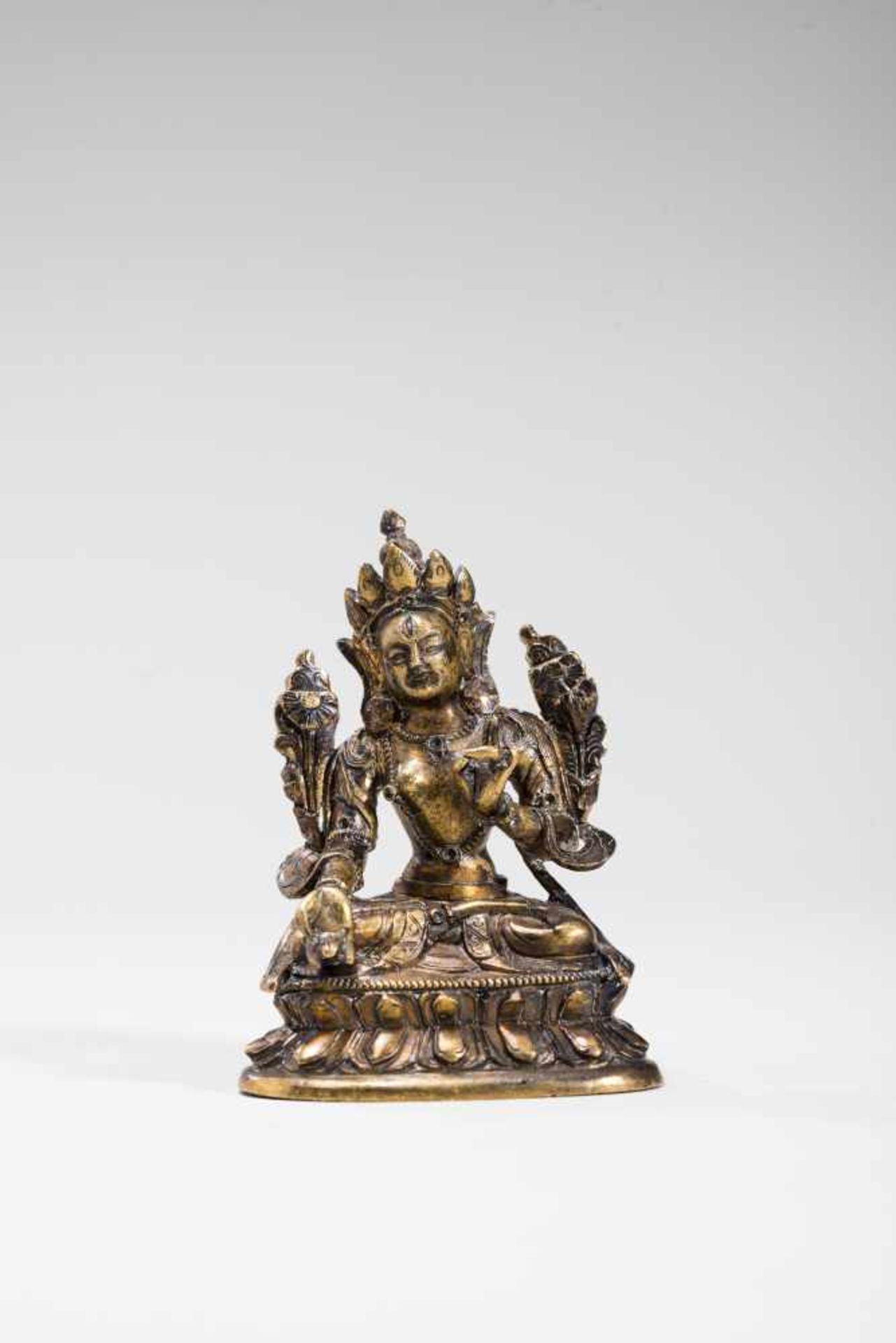 A SINO-TIBETAN GILT MINIATURE BRONZE OF SITATARA, 18TH CENTURYGilt bronzeTibet, 18th centurySitatara