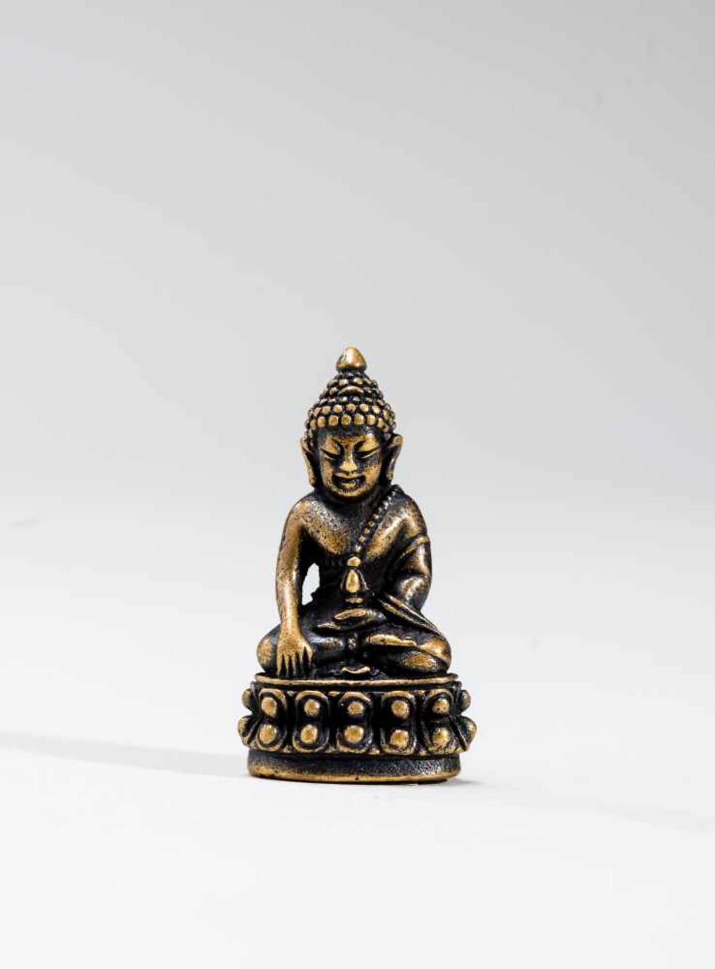 A SINO-TIBETAN MINIATURE BRONZE OF BUDDHA SHAKYAMUNI, 18TH-19TH CENTURYBronzeTibet, 18th to 19th