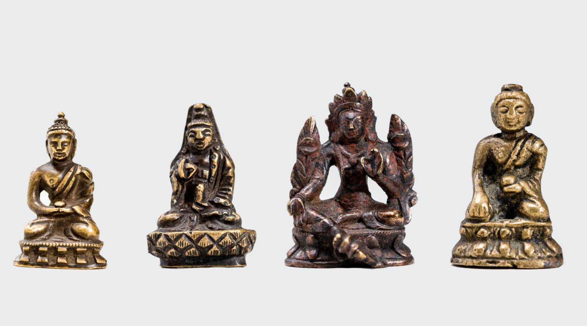 FOUR SMALL CULT BRONZESBronze, some gildingTibet, 18th to 19th centuryA collection of four cult